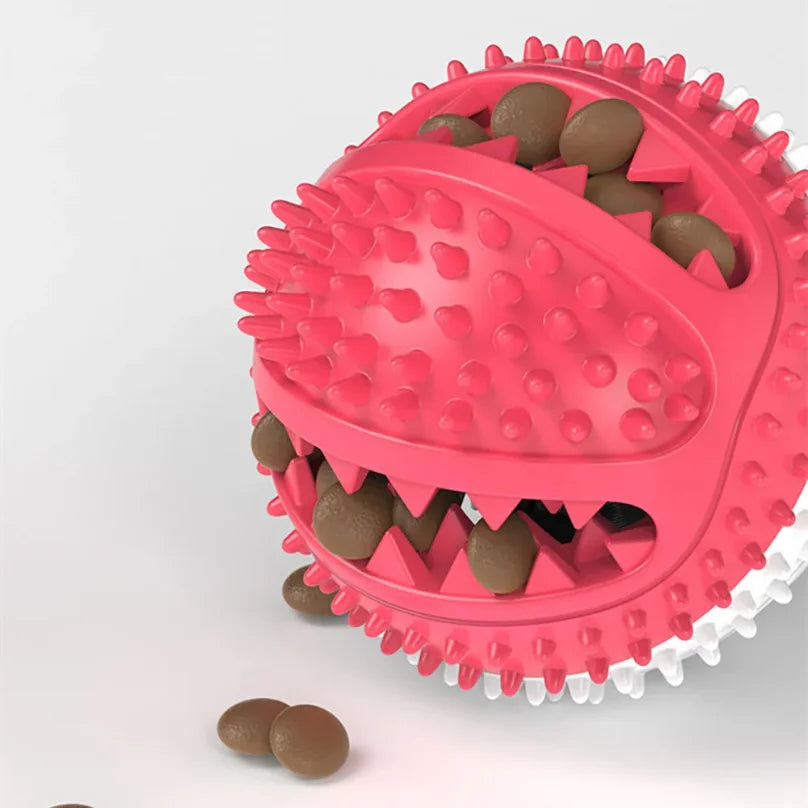 Juguete interactivo con ventosa para perro en forma de pelota, diseñado para jugar y dispensar golosinas.