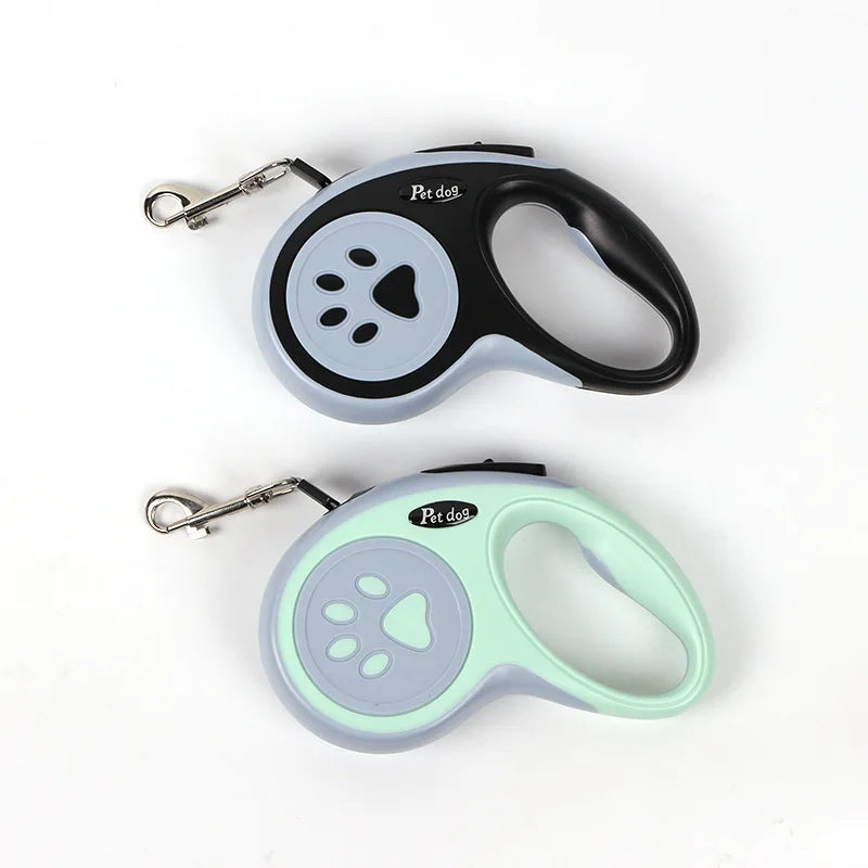 Correa Retráctil para Perro de 3 o 5 m en colores bleu et vert avec une poignée ergonomique.