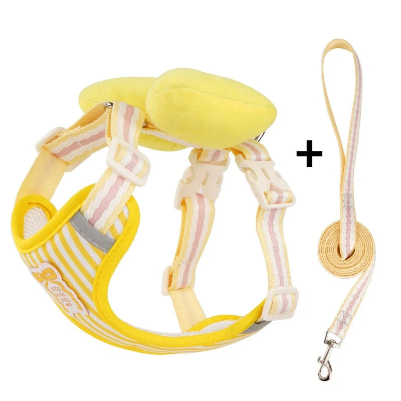 Arnés con moño para perro pequeño de color amarillo avec laisse assortie, idéal pour les promenades stylées.