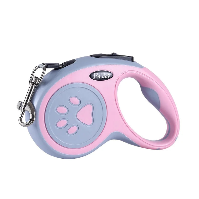 Correa Retráctil para Perro de 3 o 5 m con empuñadura ergonómica en colores rose et bleu.