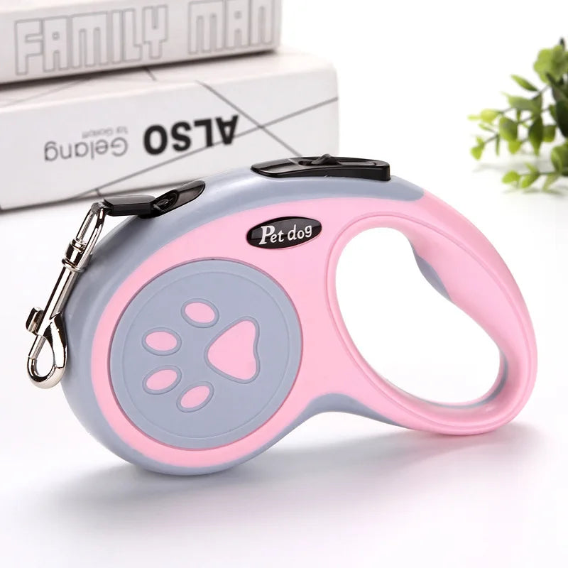 Correa Retráctil para Perro de 3 o 5 m en color rose avec poignée ergonomique et système de freinage.