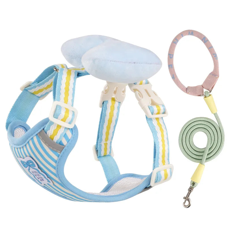 Arnés con moño para perro pequeño de color azul, con correa assortie pour des promenades stylées.