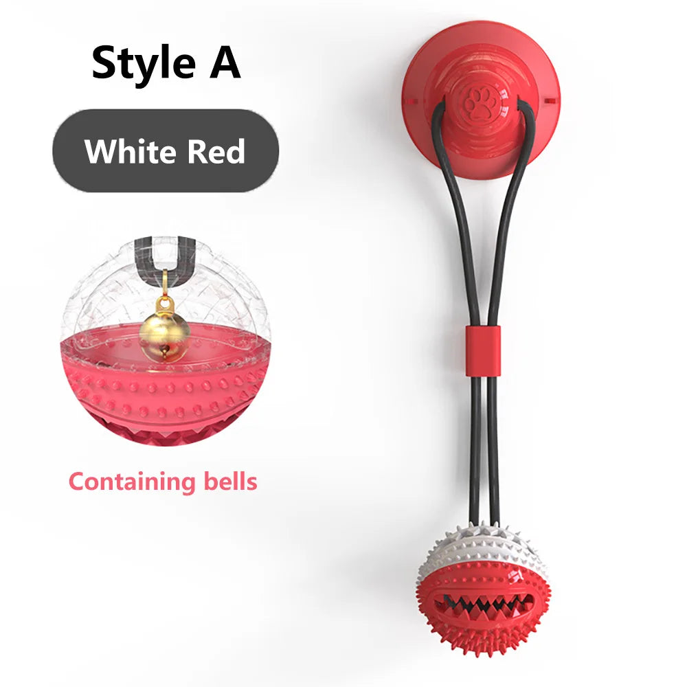 Juguete interactivo con ventosa para perro, diseño en rojo y blanco, con pelotas que contienen campanas.