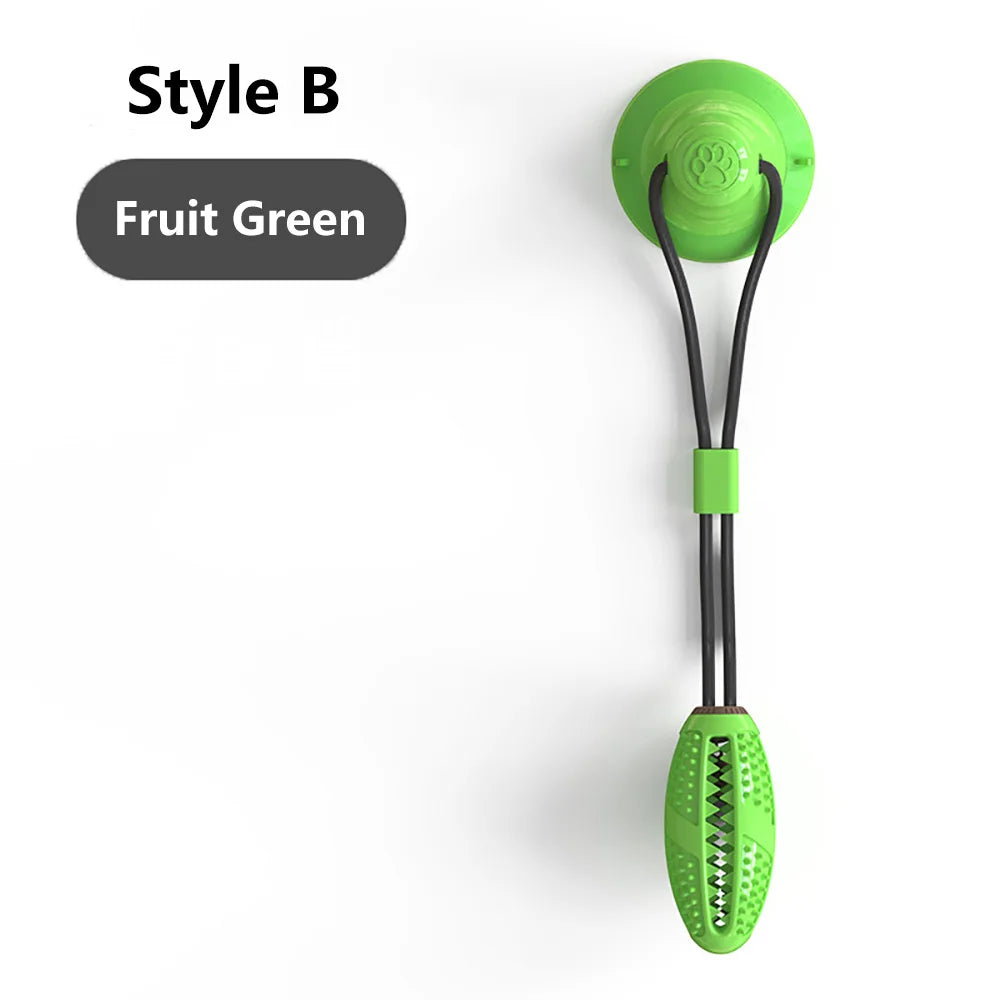 Juguete interactivo con ventosa para perro en color vert fruit, diseño firme y seguro pour le jeu.