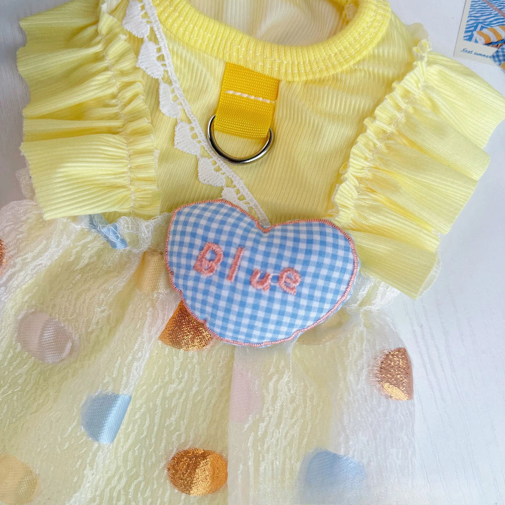 Vestido para perro falda globo en amarillo avec détails en tissu léger et motifs à pois.