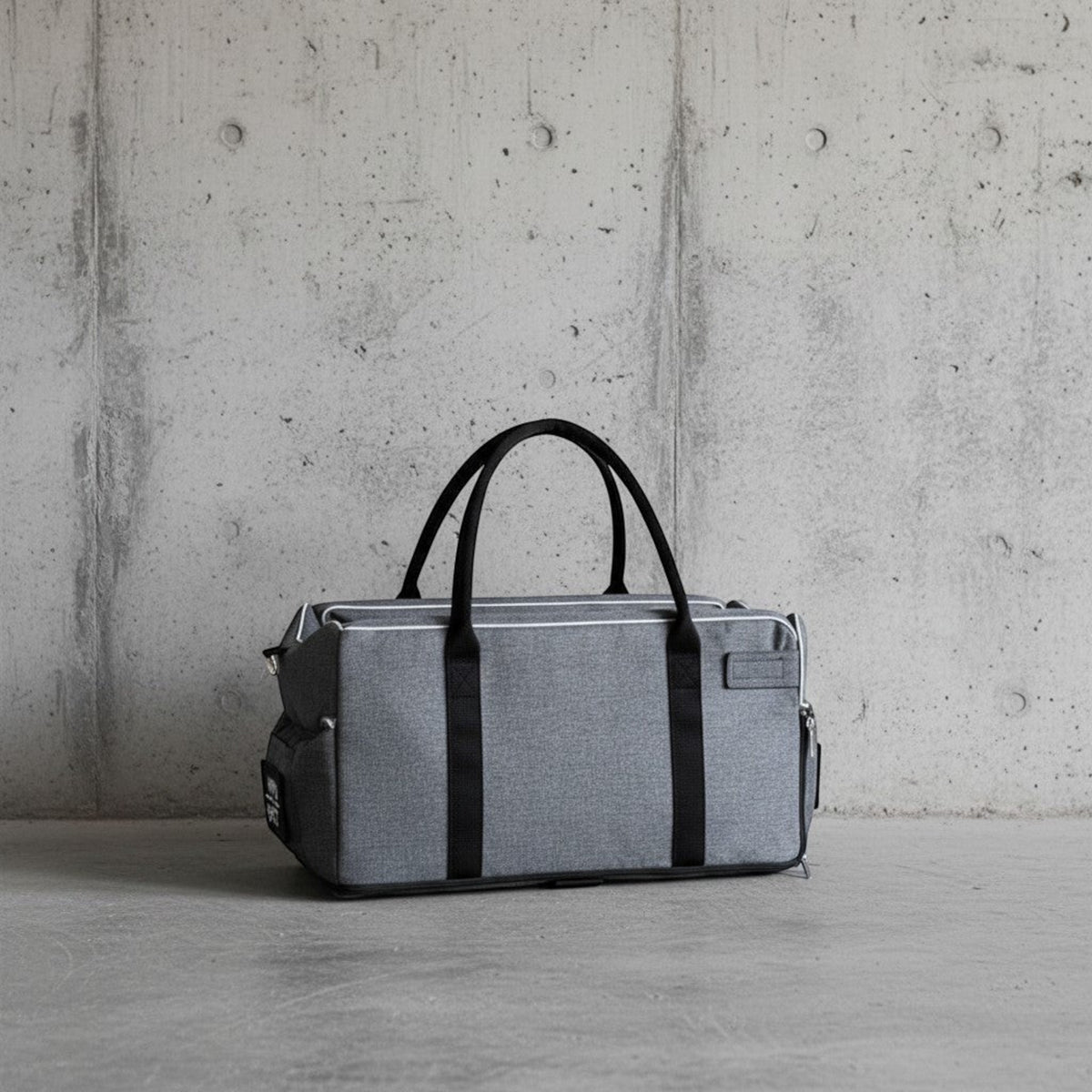 Sac de transport pour animaux MITZON gris en tissu mélangé, idéal pour la sécurité des petits chiens et chats en voiture.